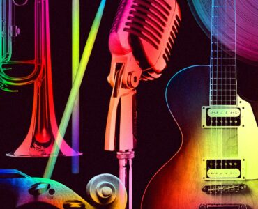 Sheet music arranged beside musical instruments for music theory study