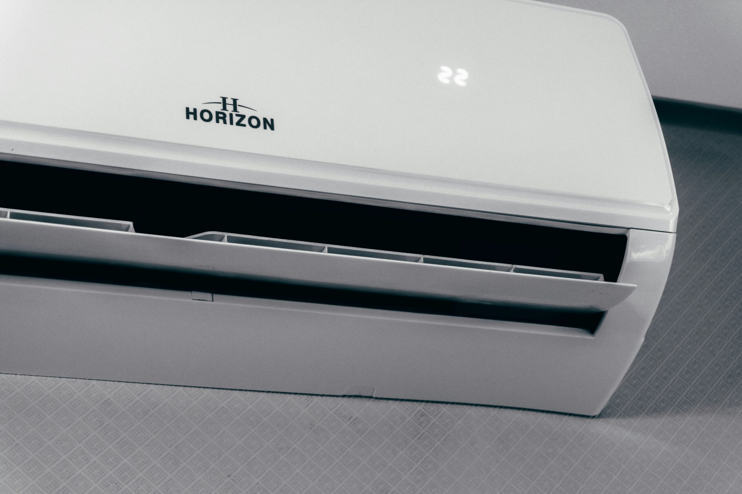A wall-mounted air conditioner that can cool a room and remove some moisture from humid air