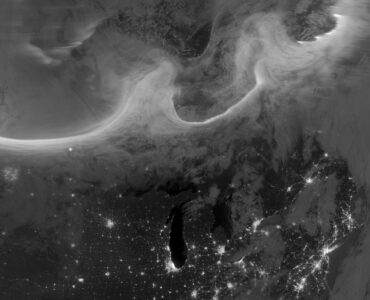 Satellite view of auroral light over North America during active space weather