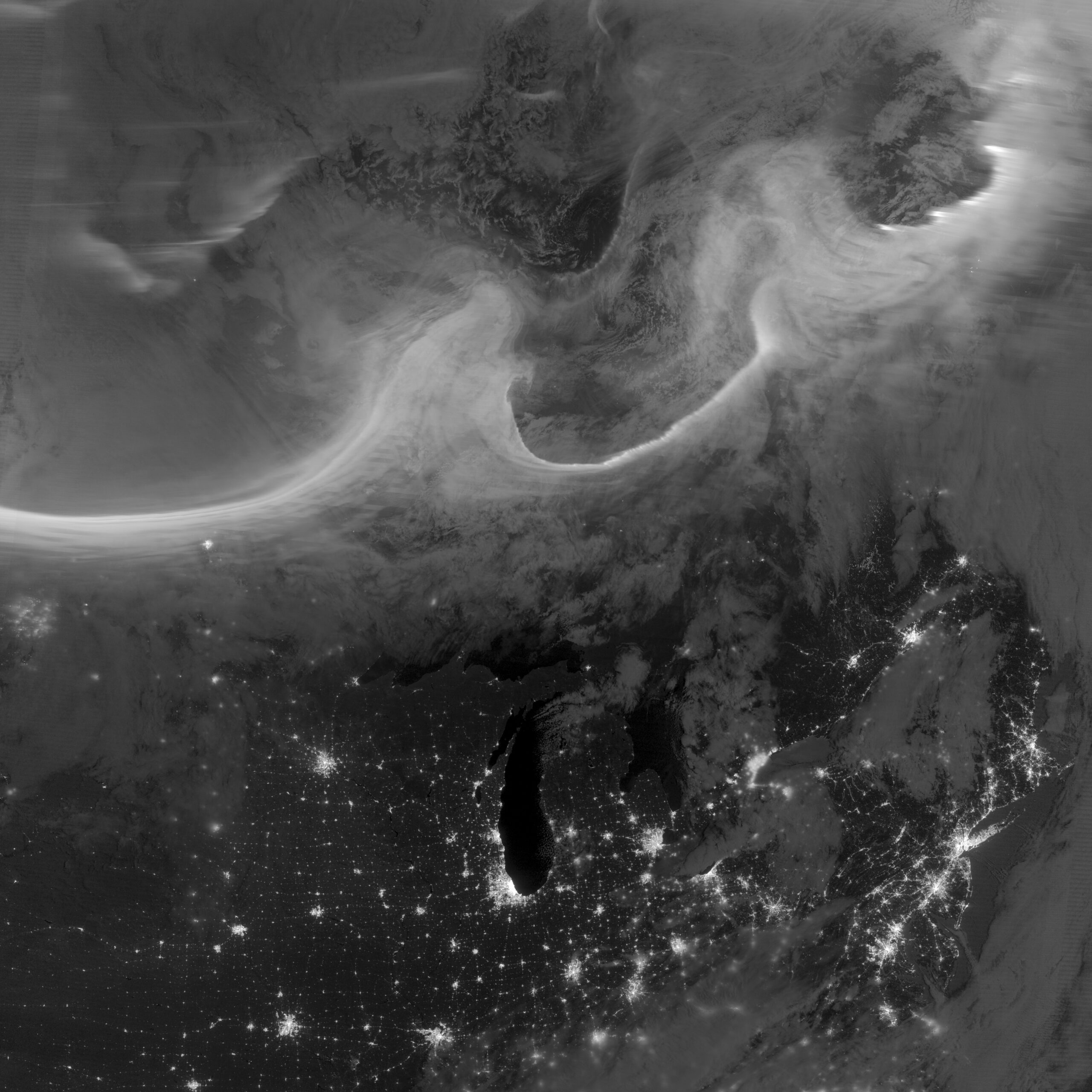 Satellite view of auroral light over North America during active space weather