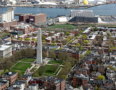 Aerial view of the Bunker Hill Monument and surrounding Charlestown neighborhood in Boston.