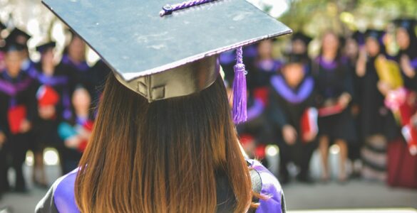 College students walking on campus while families plan how to use education savings