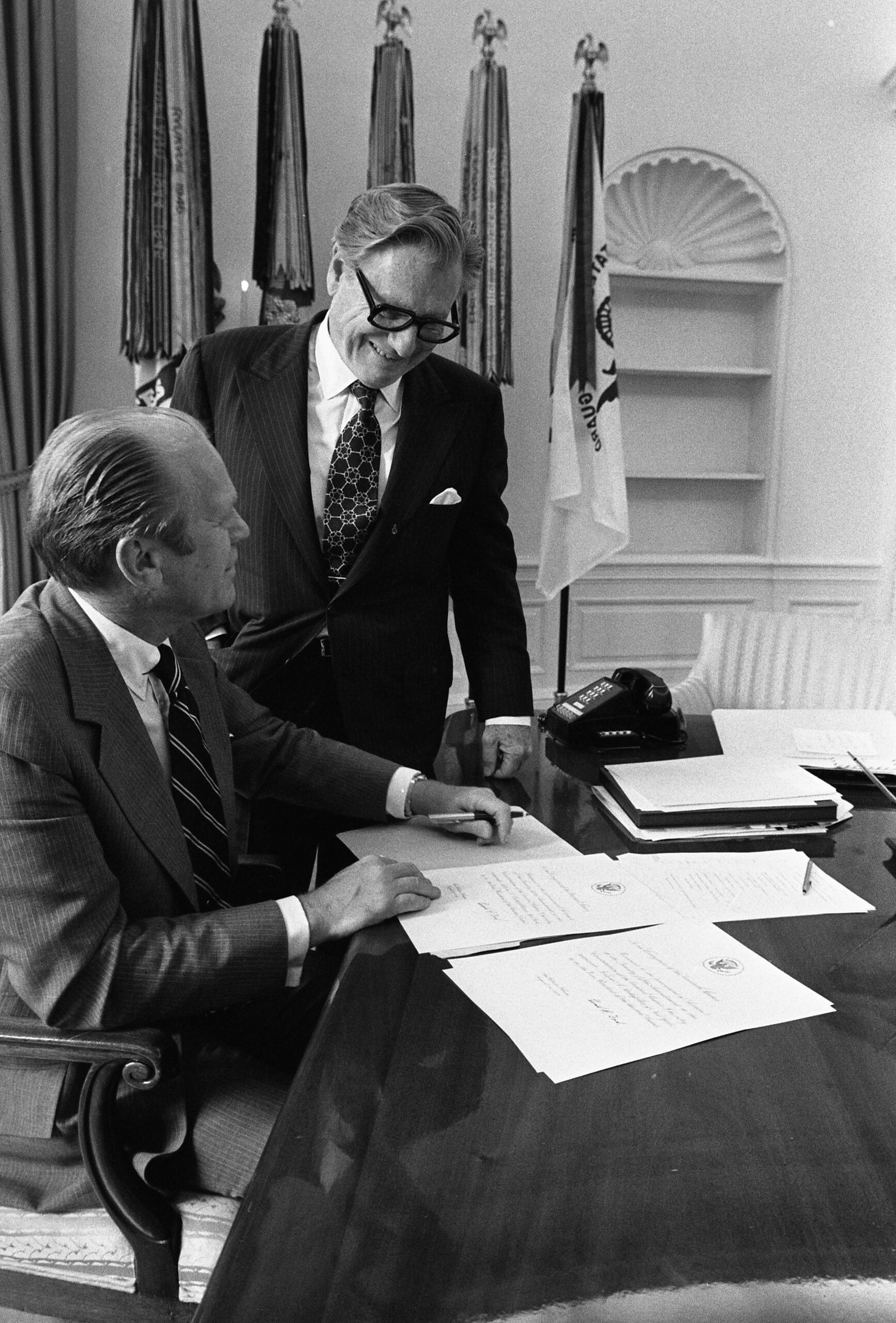 President Gerald Ford meets with Vice President-designate Nelson Rockefeller in the Oval Office.