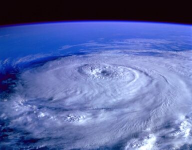 A hurricane seen from space, showing the spiral structure that forecasters track and name.