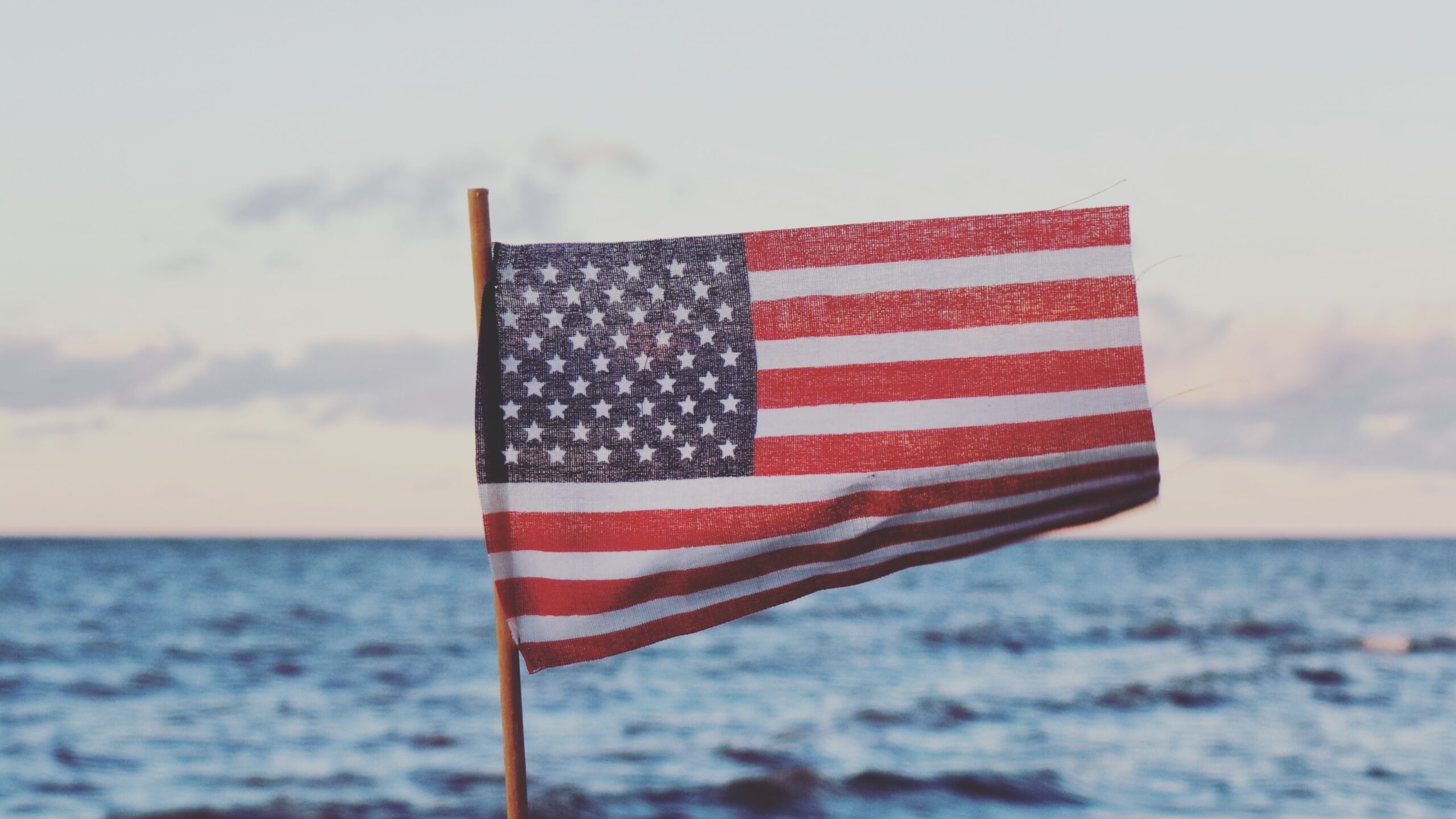 A close view of the stars and stripes on a waving United States flag