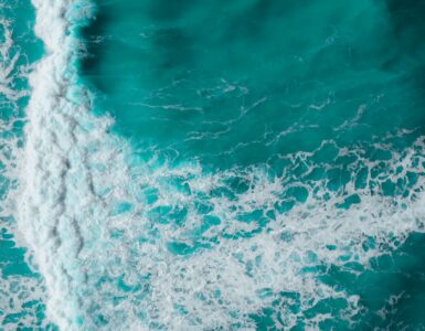 Aerial view of ocean surface patterns that can help scientists study water movement and temperature changes.