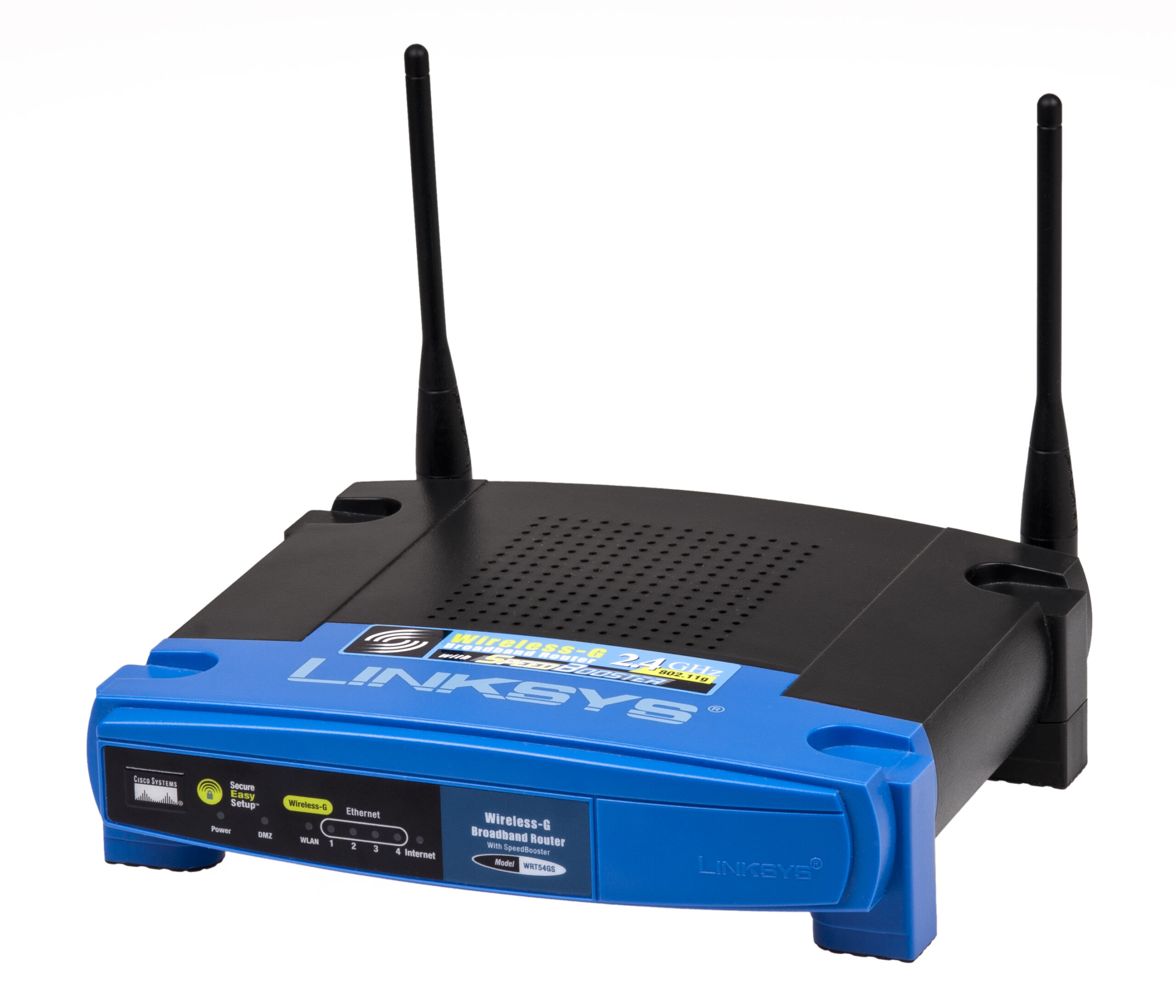 An older home wireless router with antennas, showing common equipment that shares crowded Wi-Fi channels.