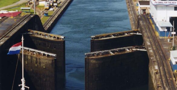 A ship approaches open gates at the Gatun Locks of the Panama Canal.