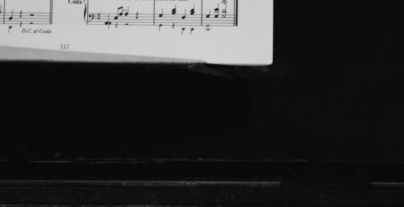 Piano keys and sheet music for studying phrase endings and cadences.