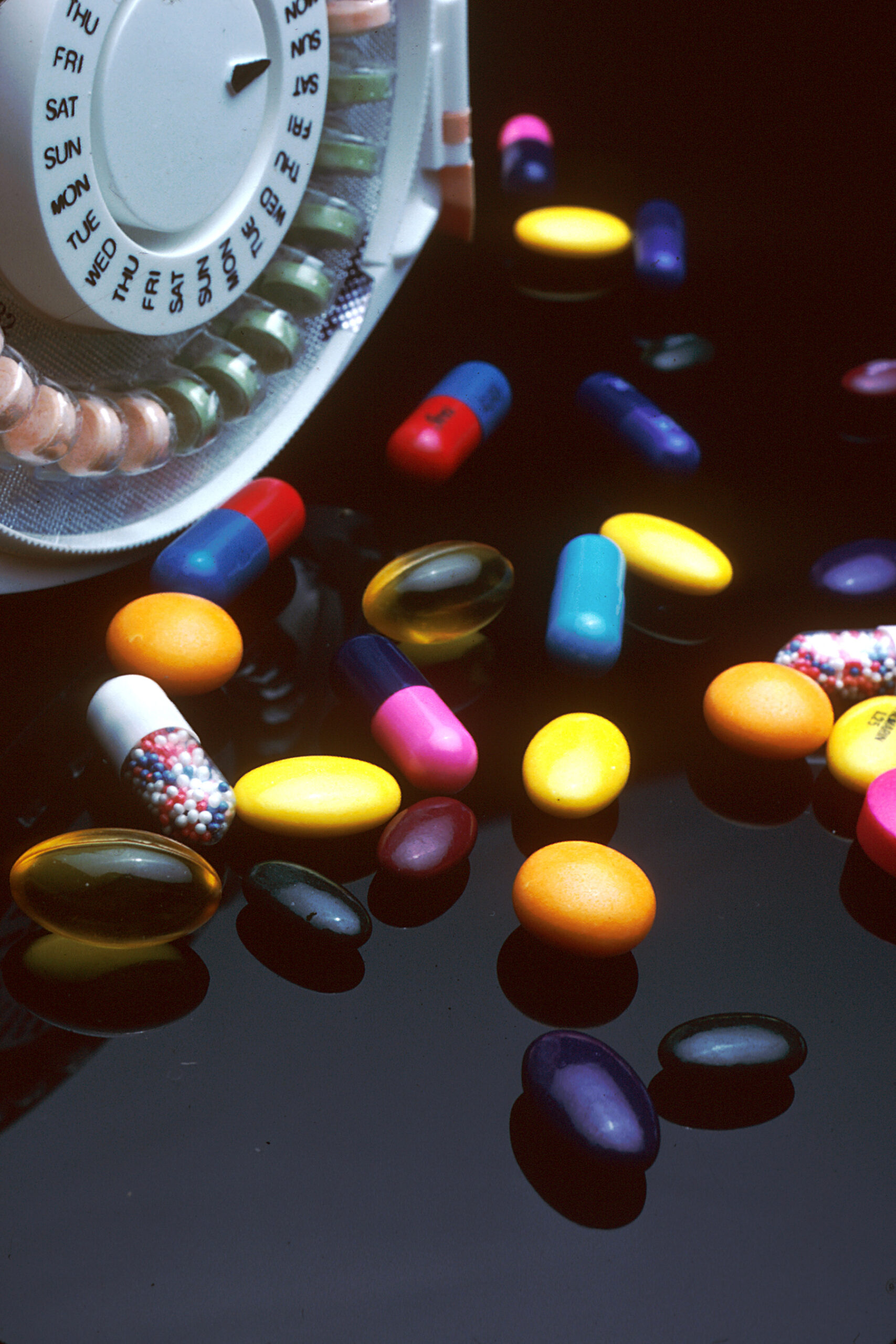 An array of prescription medicines representing clinical trial comparison groups