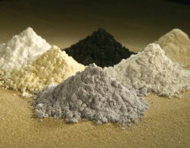 Piles of rare-earth oxide powders used to show different rare earth elements