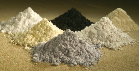 Piles of rare-earth oxide powders used to show different rare earth elements