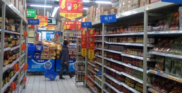 Retail sale price tags on a store shelf