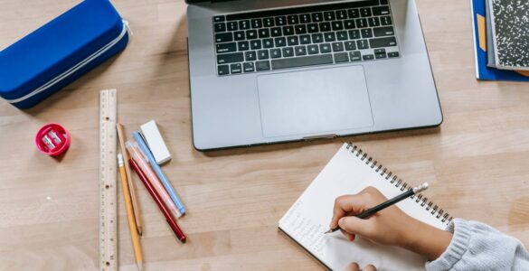 A student organizing notes and deadlines while planning a structured gap year before college.