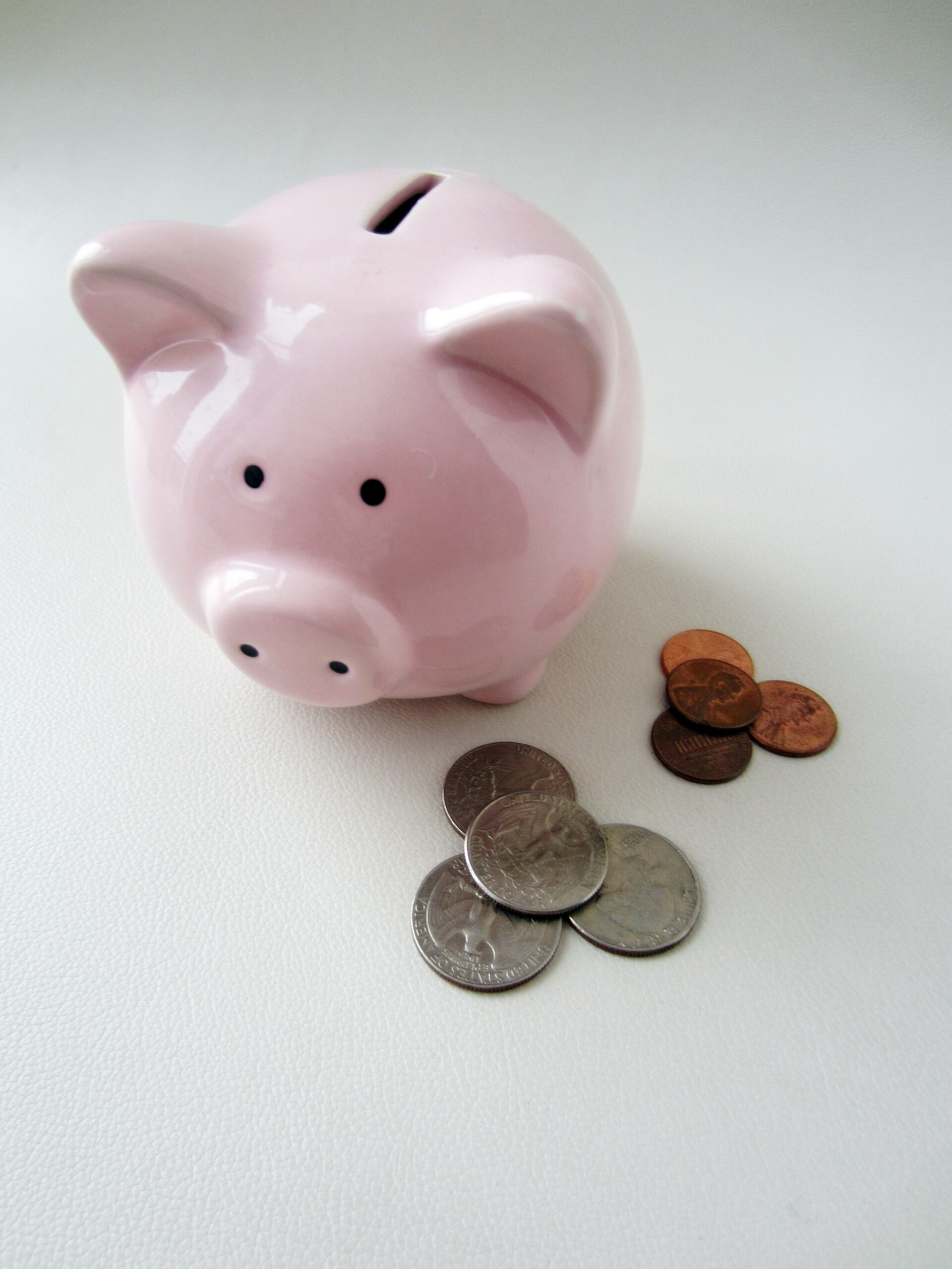 A piggy bank filled with coins, representing saving money over time