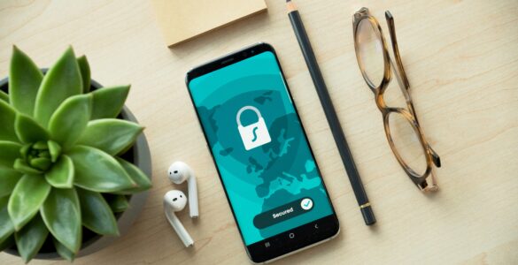 A smartphone showing a security lock screen on a desk.