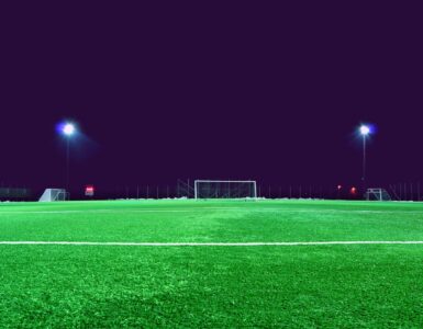 A soccer stadium field seen from the stands