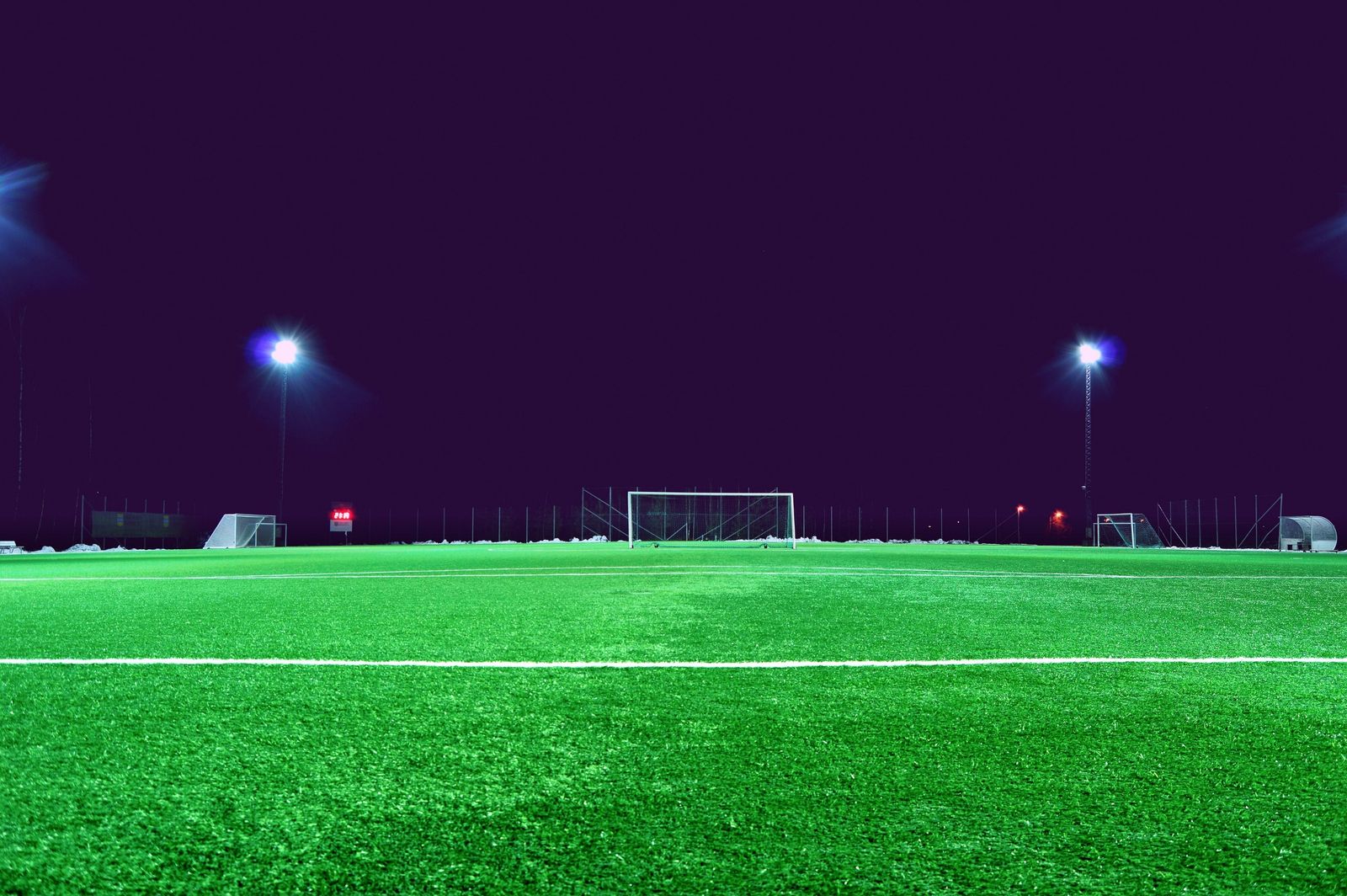 A soccer stadium field seen from the stands