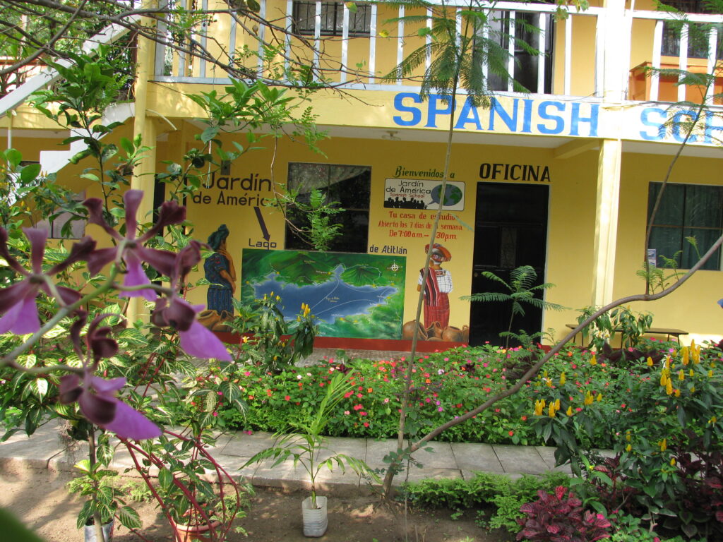 A Spanish school classroom with desks and learning materials