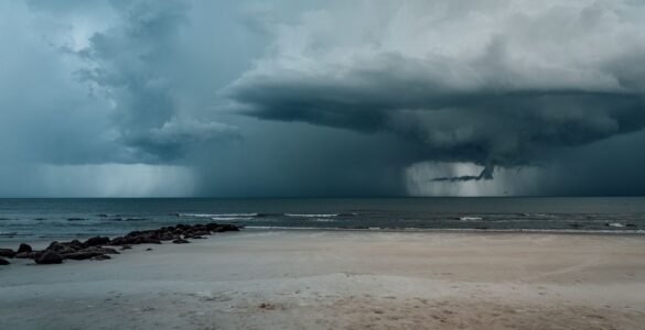 Dark storm clouds gathering over the ocean before a coastal storm
