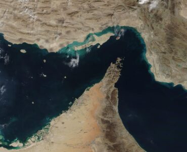 Satellite view of the Strait of Hormuz between Iran, Oman, and the United Arab Emirates