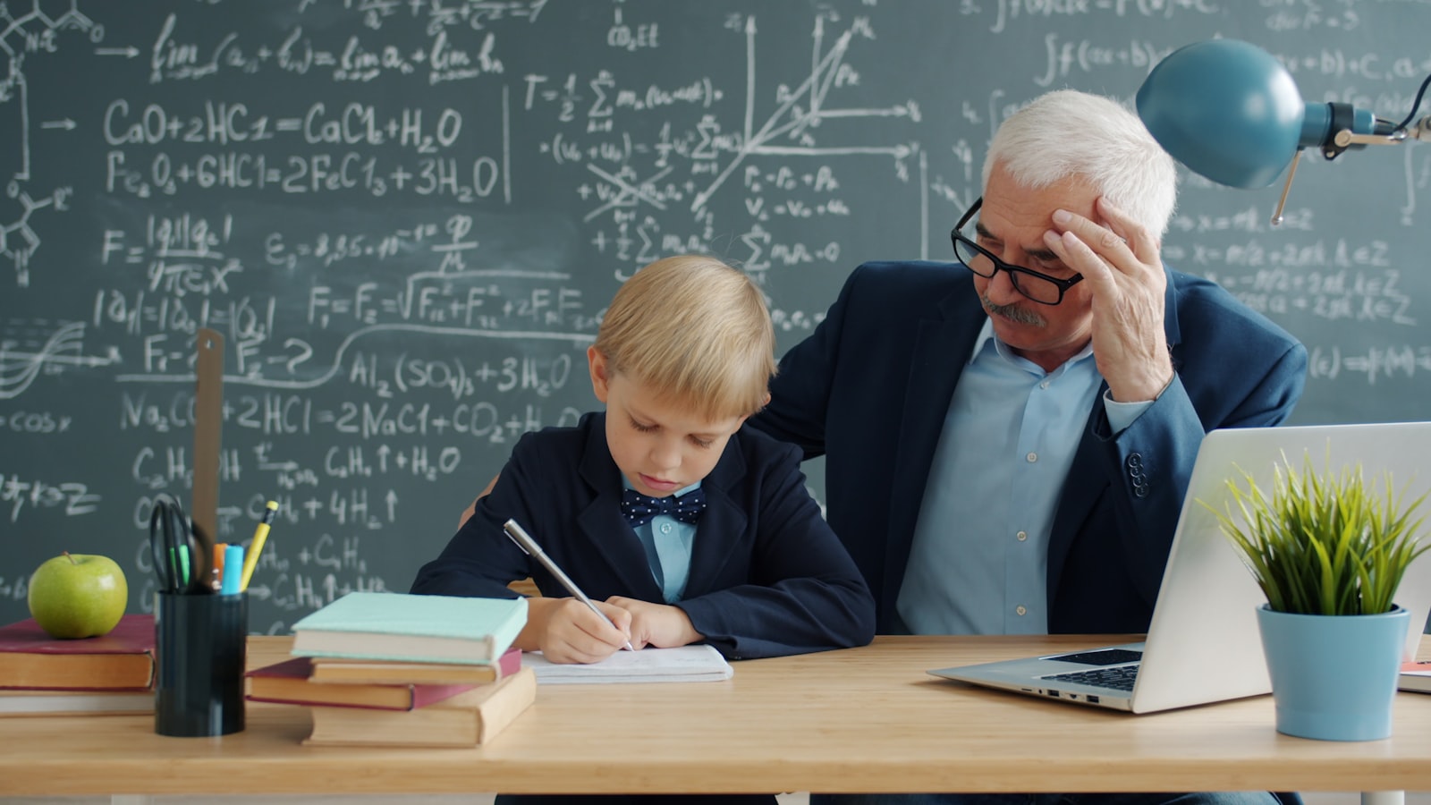 A student practicing math with guidance at a desk