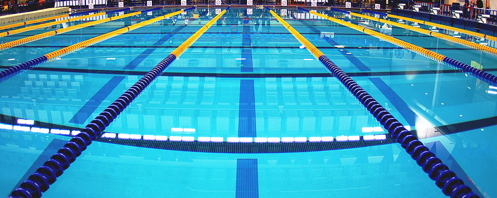 Swimming pool lanes divided by floating lane ropes