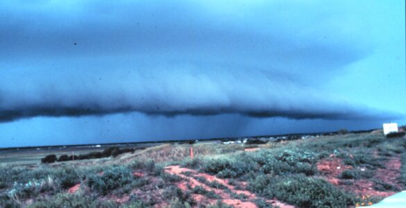 A shelf cloud at the leading edge of a thunderstorm where strong outflow winds can spread along the ground.