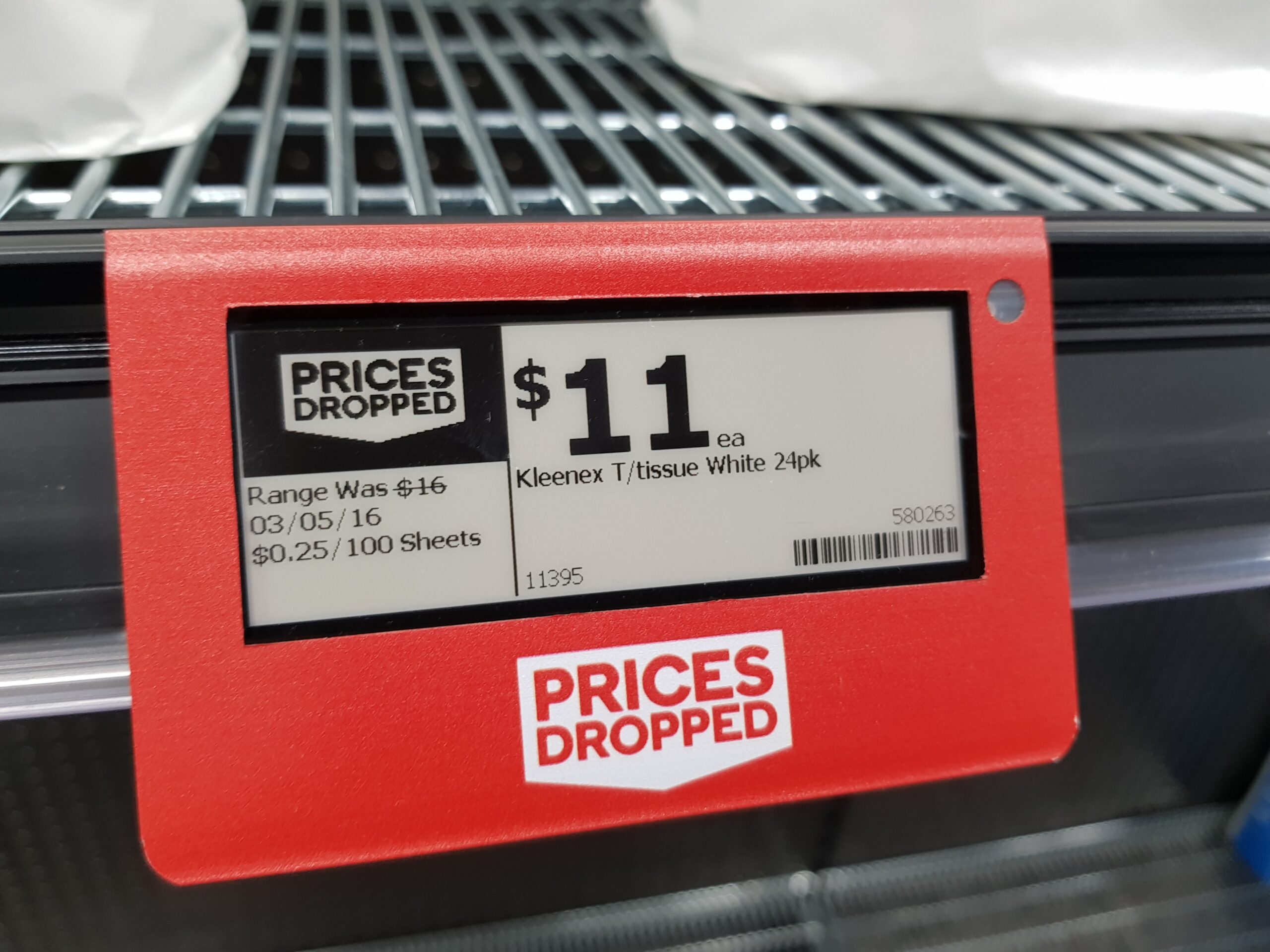 A supermarket shelf tag showing the price of a grocery item