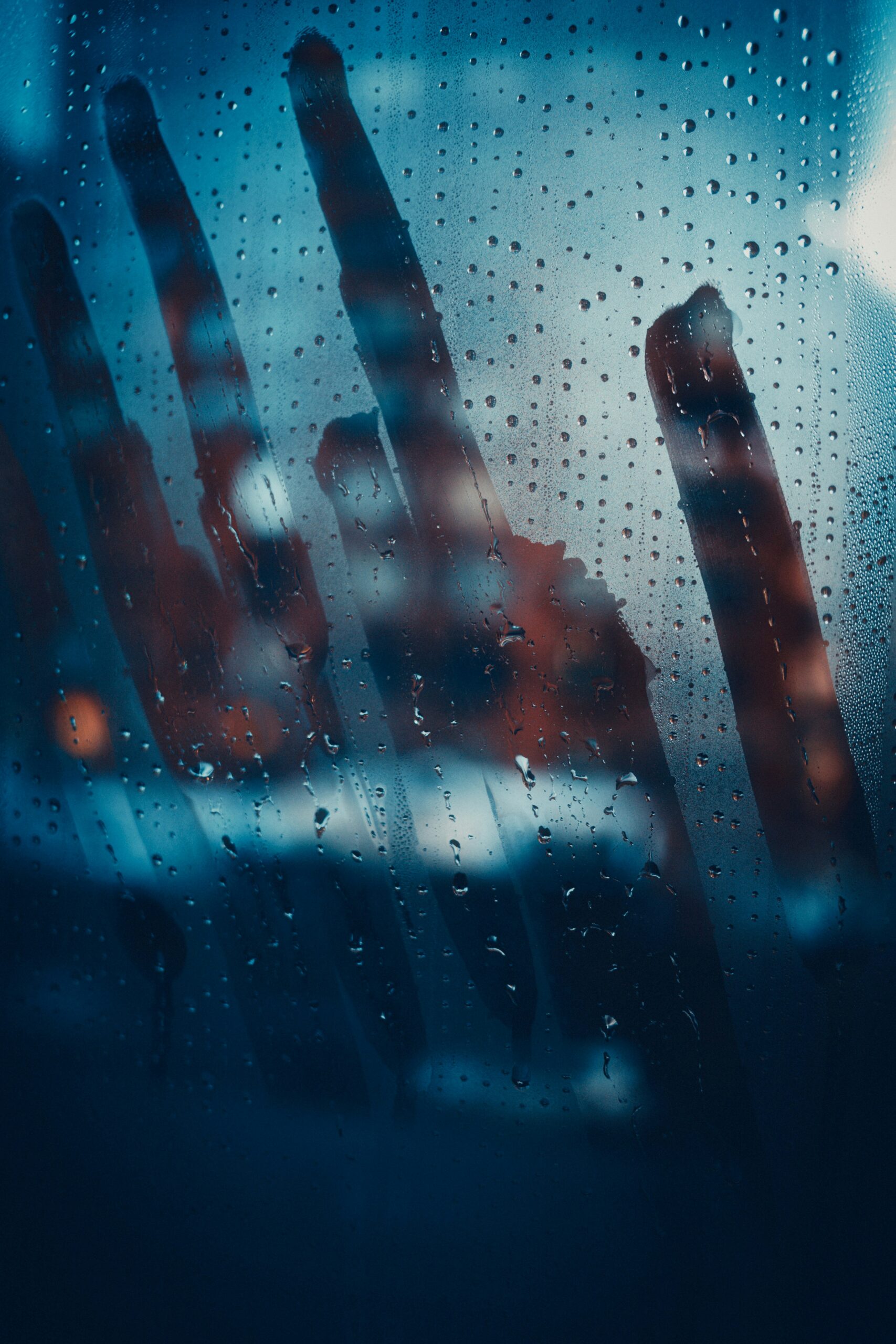 Water droplets collected on a cool glass surface