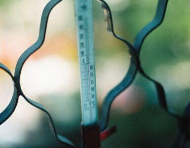 Close-up of an outdoor thermometer used to think about heat and humidity measurements.
