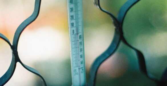 Close-up of an outdoor thermometer used to think about heat and humidity measurements.