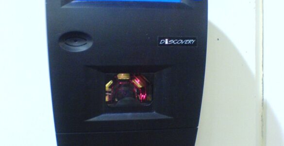A supermarket barcode scanner used to read product codes from packages.