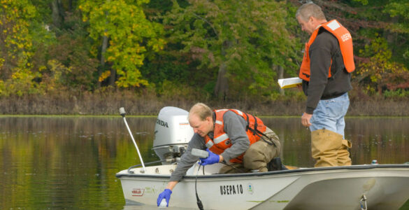 Scientists collect water samples that can be tested for environmental DNA from nearby species