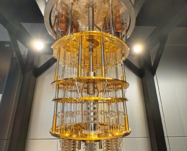 An IBM Quantum System One machine, representing the specialized hardware used to control qubits.
