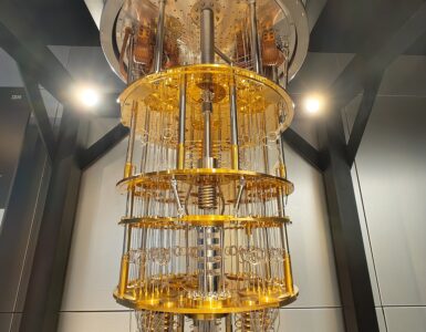 An IBM Quantum System One machine, representing the specialized hardware used to control qubits.