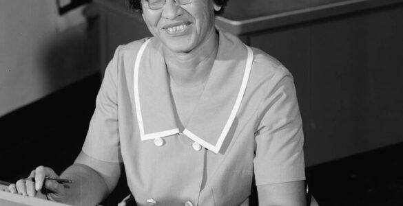 Katherine Johnson seated at a desk at NASA Langley in 1966
