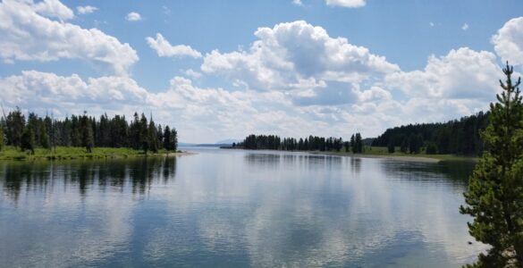 A calm summer lake where warm surface water can form a separate layer above colder deep water.