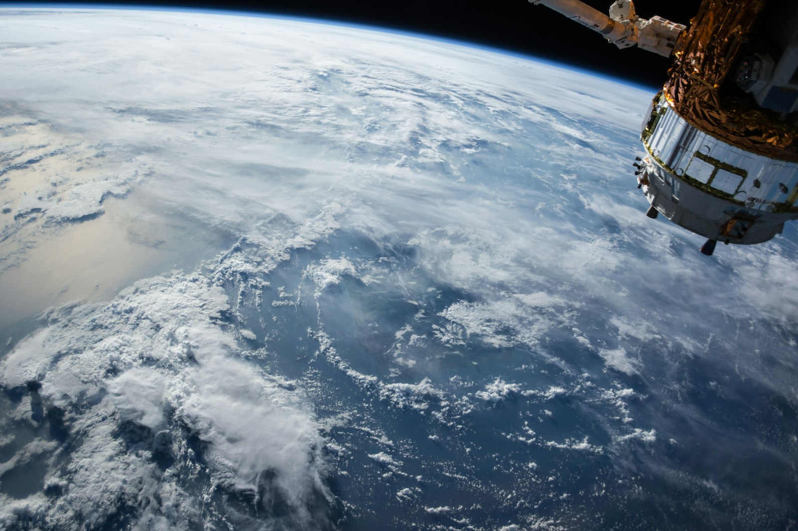 A satellite above Earth representing navigation systems that depend on precise time