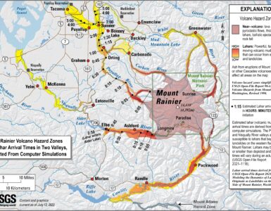 Map of Mount Rainier lahar hazard zones and estimated arrival times in nearby river valleys.