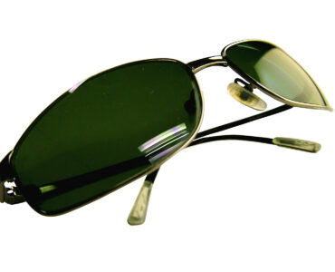 Sunglasses used to reduce bright reflected glare