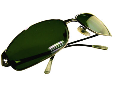 Sunglasses used to reduce bright reflected glare
