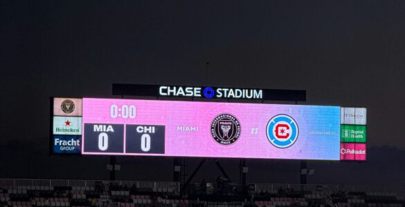 A soccer scoreboard representing how added time can change the final minutes of a match