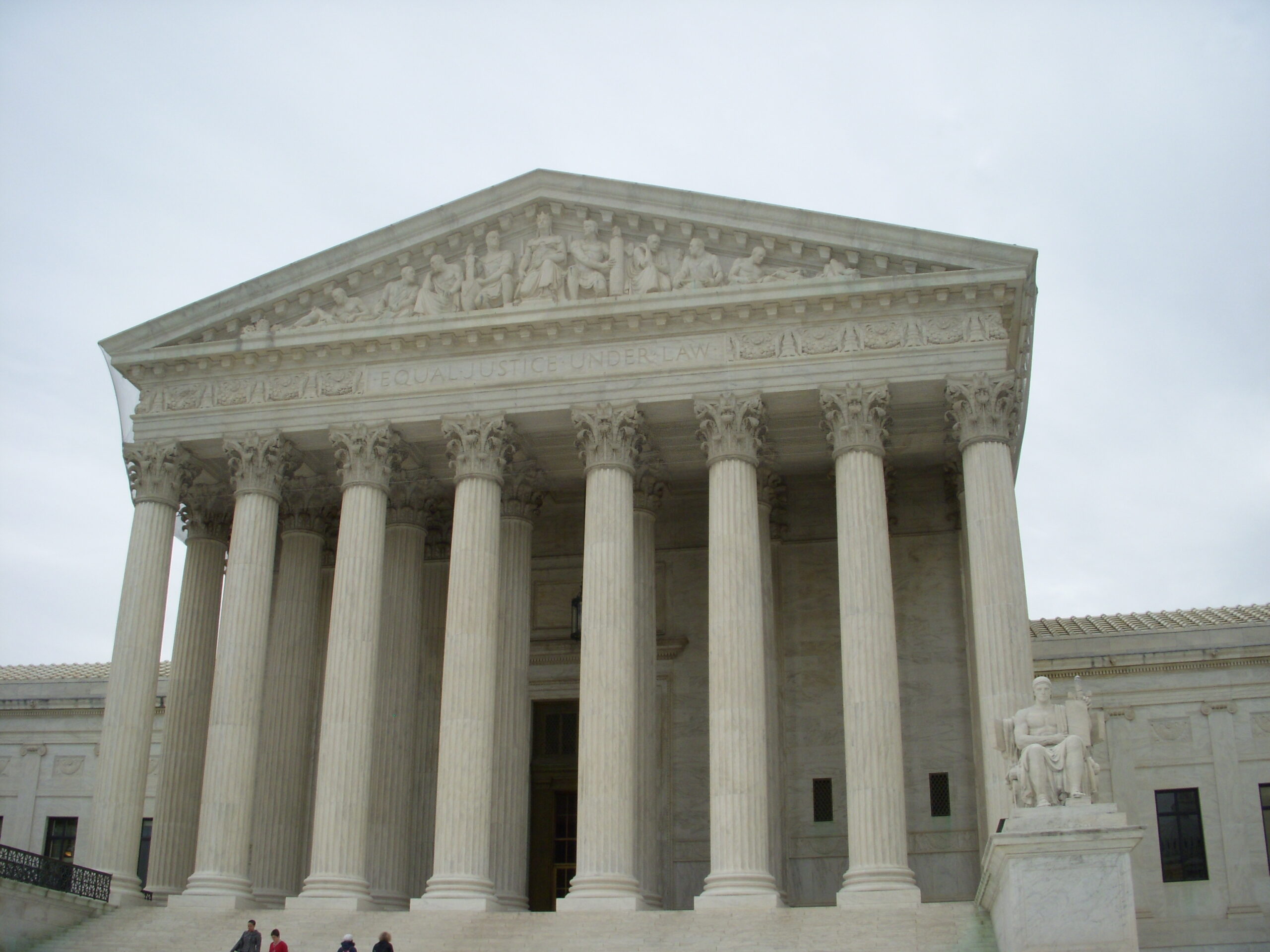 The U.S. Supreme Court building, representing judicial review of presidential action.