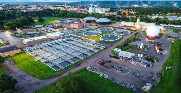 Aerial view of a wastewater treatment facility where community wastewater can be sampled for public health monitoring.