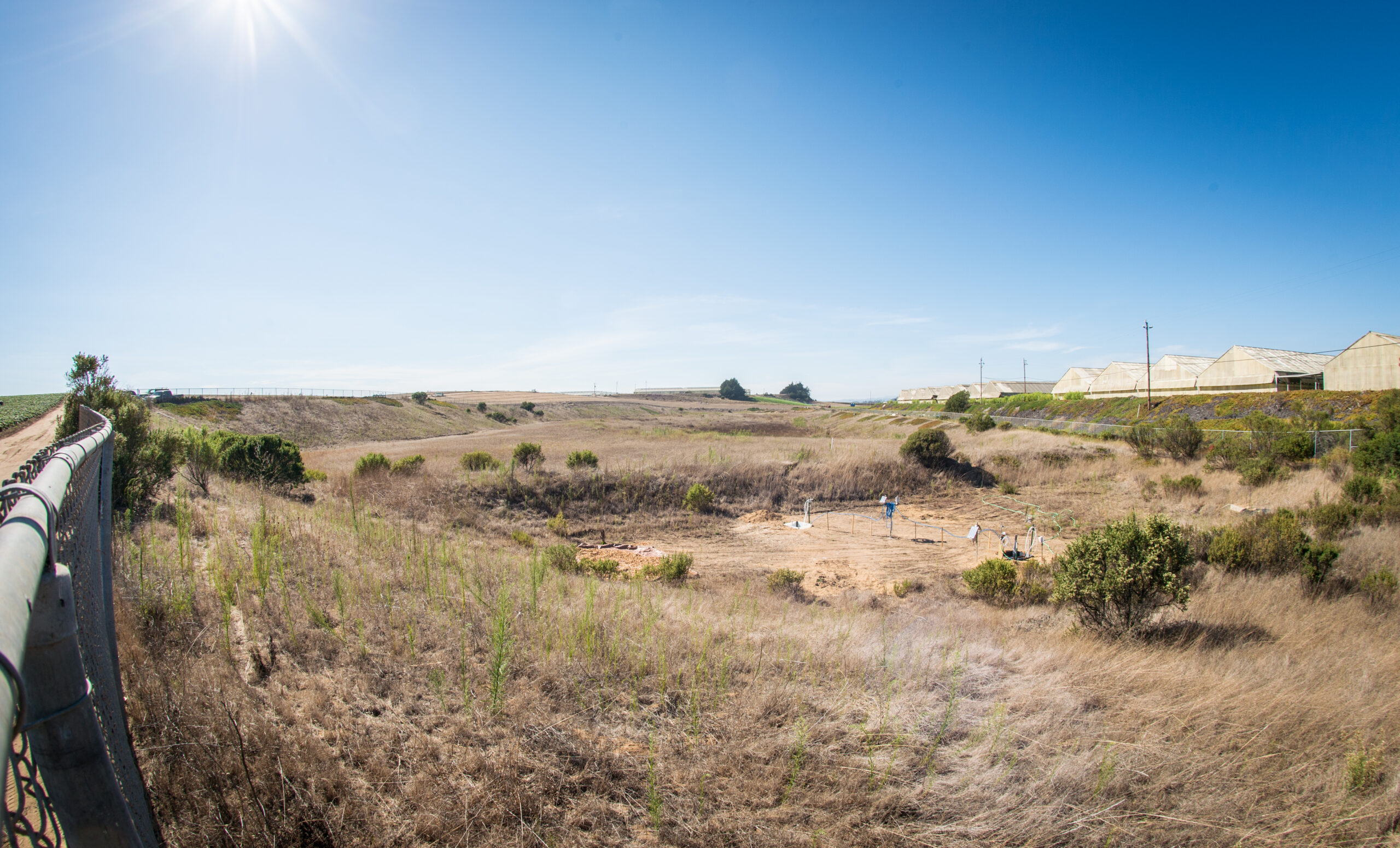 Managed aquifer recharge basin holding water that can seep into underground aquifers