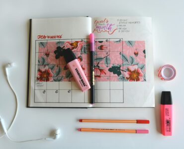 Highlighters and a study planner arranged for choosing useful school supplies without copying every online haul.