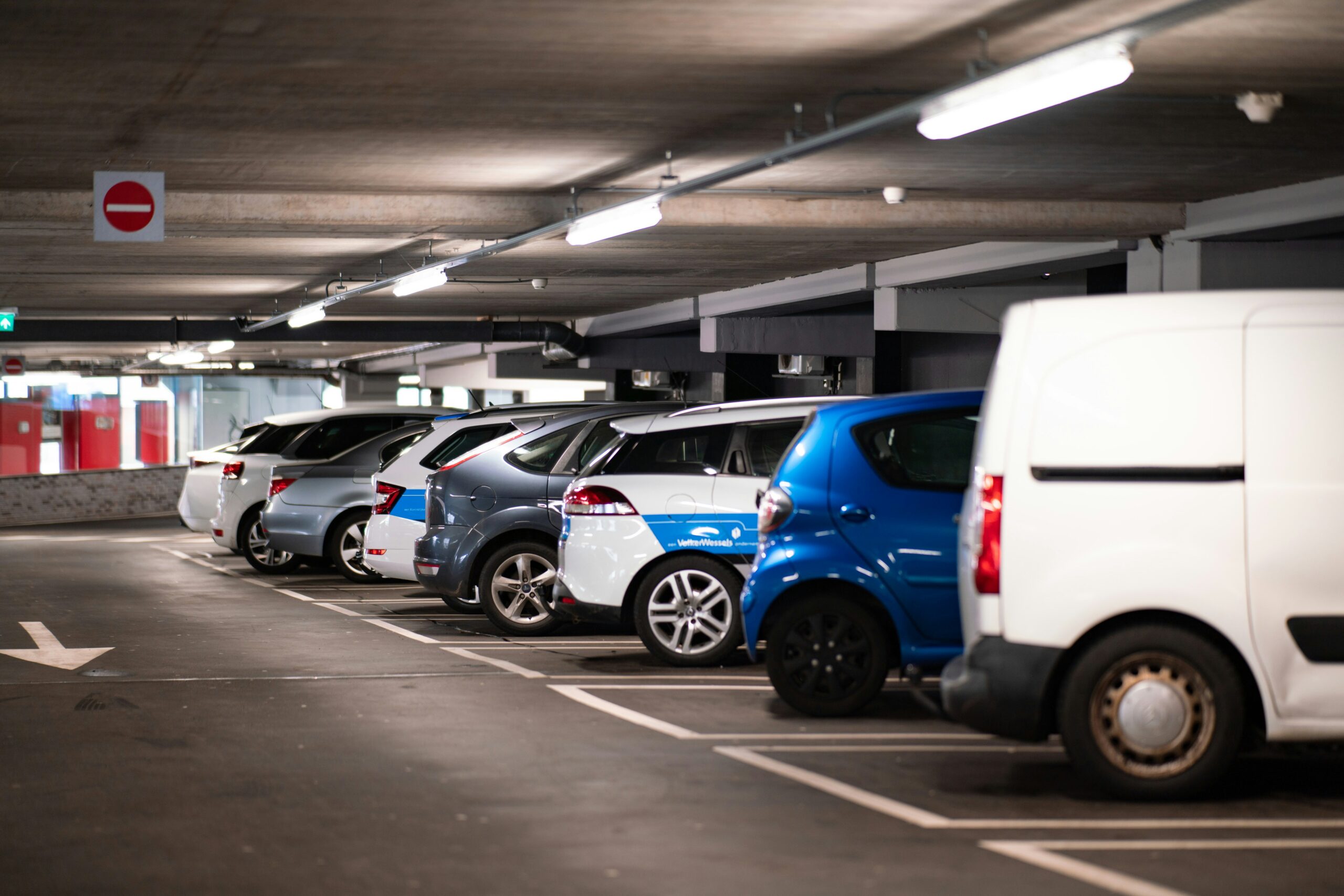 Cars parked in a garage, showing how campus parking areas can be assigned by permit type and zone.