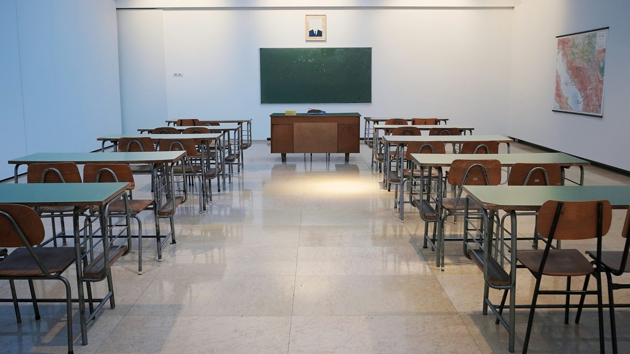 Classroom desks where students may carry books, laptops, and supplies between classes