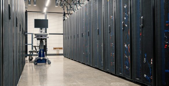 Rows of server racks representing the remote computing resources behind cloud services.